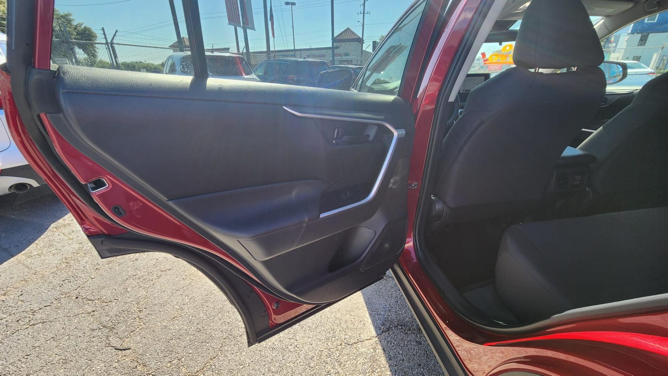 2023 Red Toyota RAV4 LE (2T3H1RFV9PW) with an 2.5L L4 DOHC 16V engine, 8A transmission, located at 1842 Wirt Road, Houston, TX, 77055, (713) 973-3903, 29.805330, -95.484787 - Photo #9